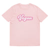 This crisp pastel pink tee featuring the design "Vegan" n a vibrant, high-definition bubble print on a white background

